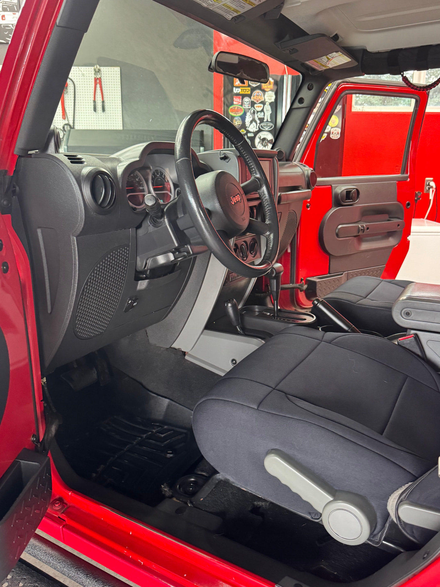 Driver's side interior of Skadi with steering wheel and dash