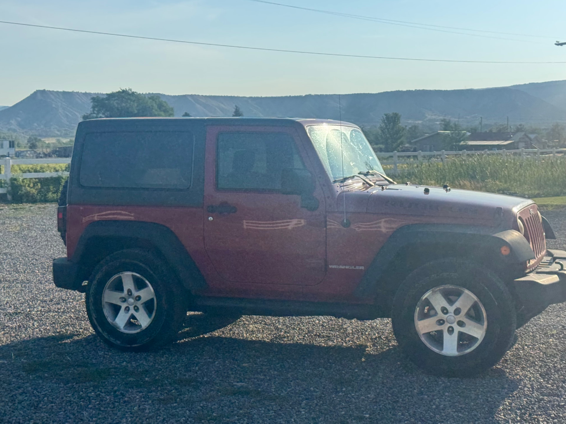 Skadi as purchased, maroon Jeep Wrangler JK before the build