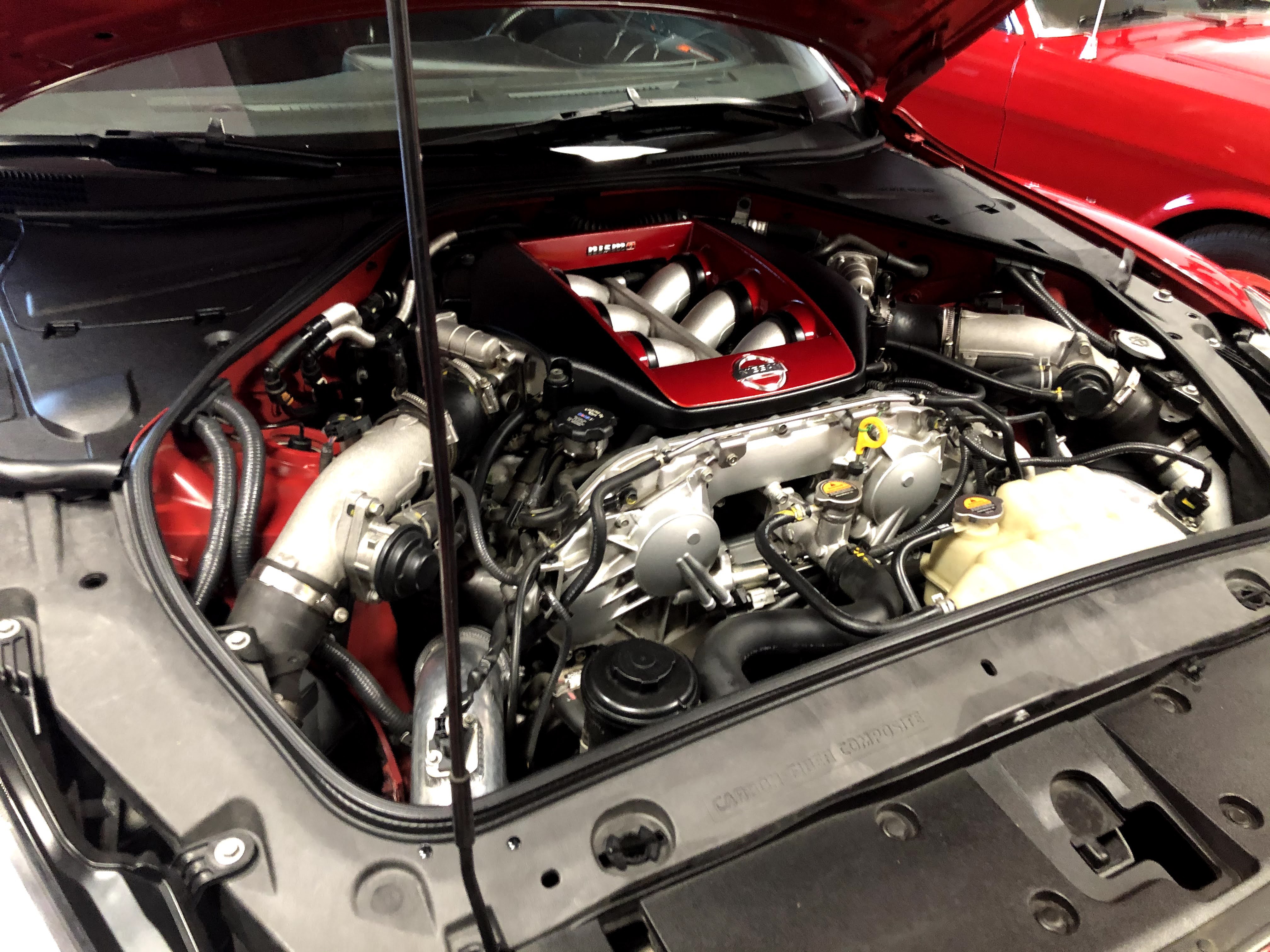 VR38DETT engine bay with Nismo intake plenum
