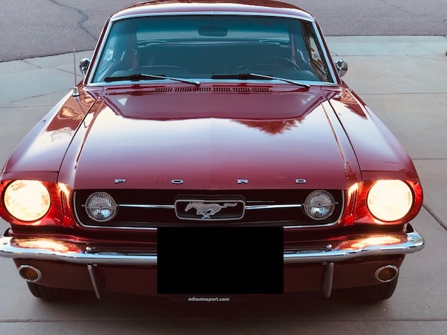 Front grille with running horse emblem