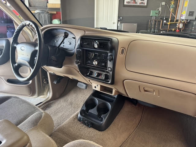 Dashboard, Kenwood head unit and new vinyl center console lid