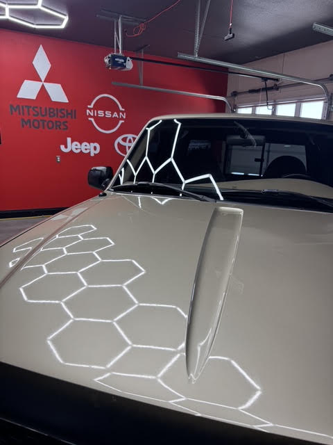 Hood and windshield after paint correction and ceramic wax