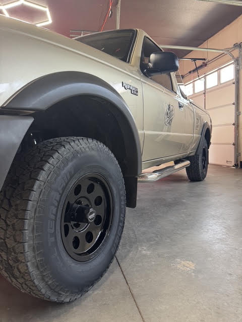 Front wheel close-up with American Racing Baja wheel and Pathfinder AT tire