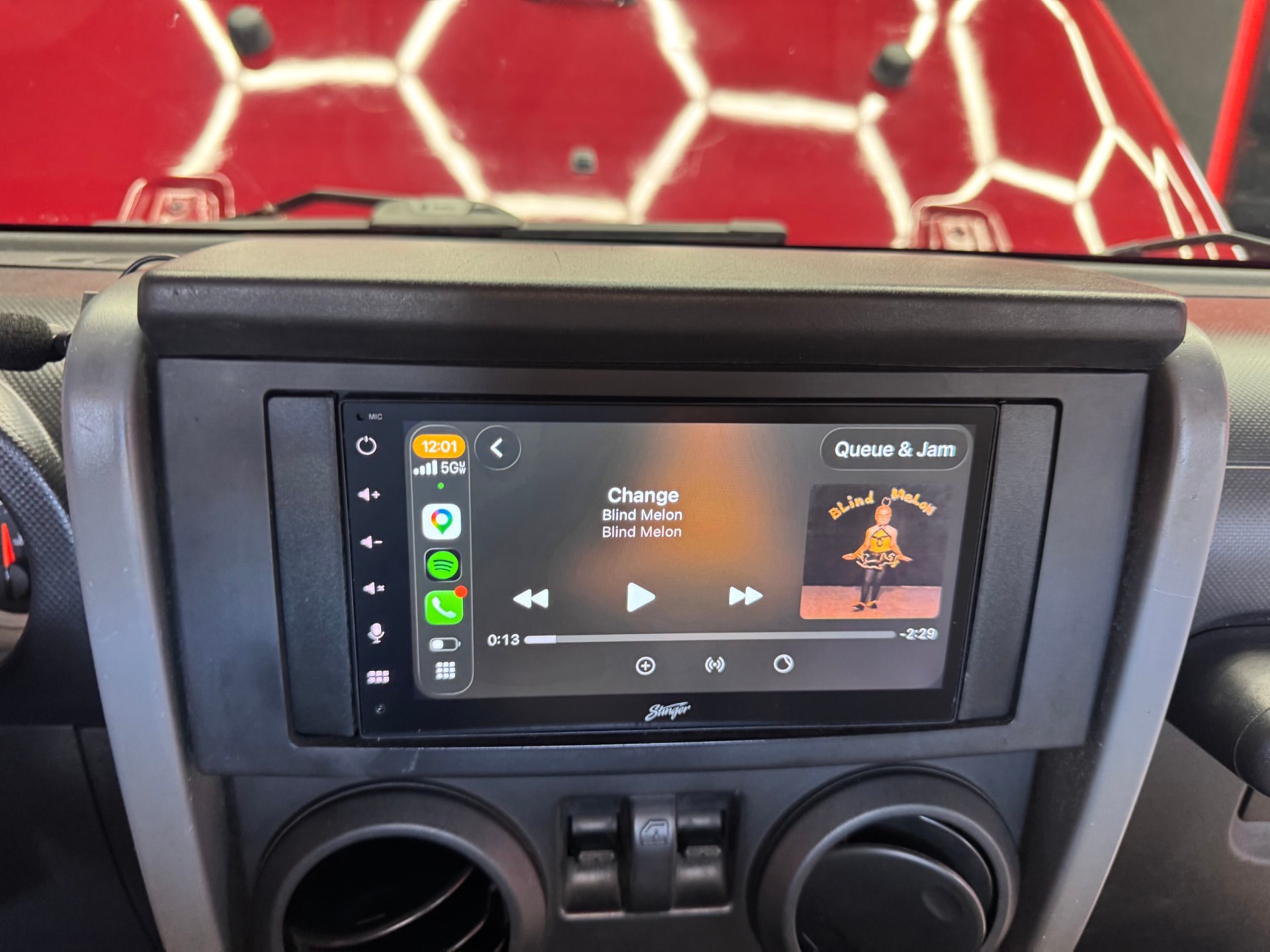 Stinger double-DIN head unit with CarPlay in Skadi's dash